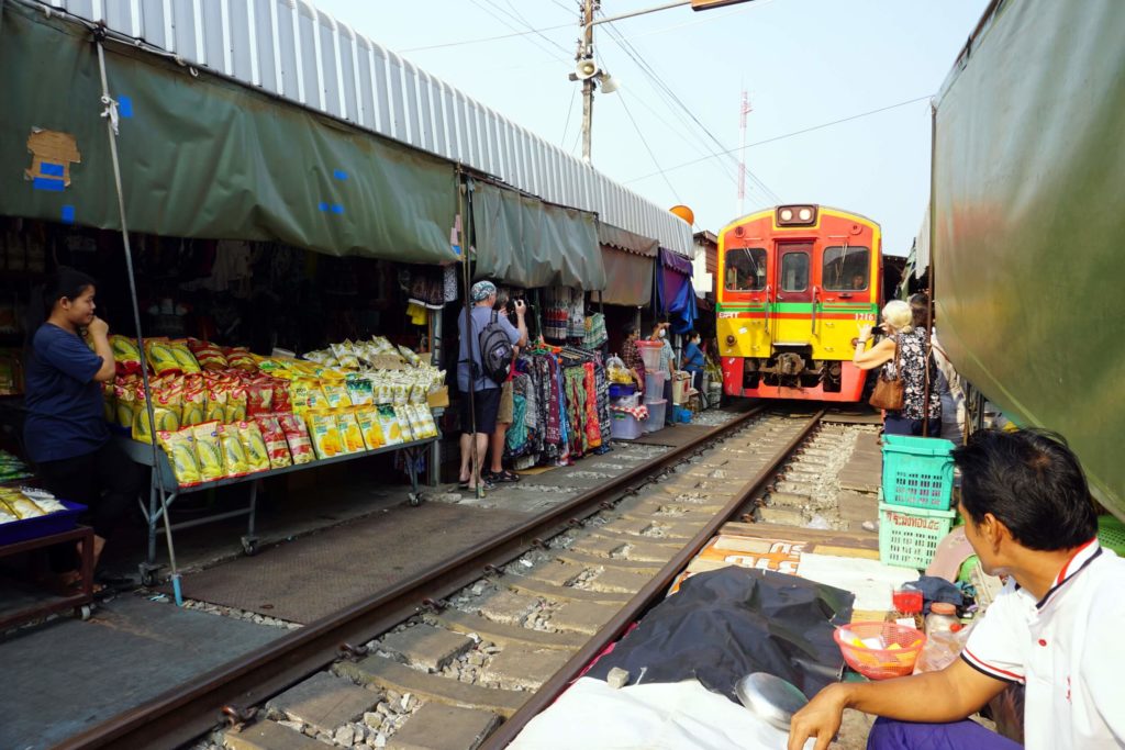 Damnoen Saduak Floating Market & Maeklong Train Market Tour
